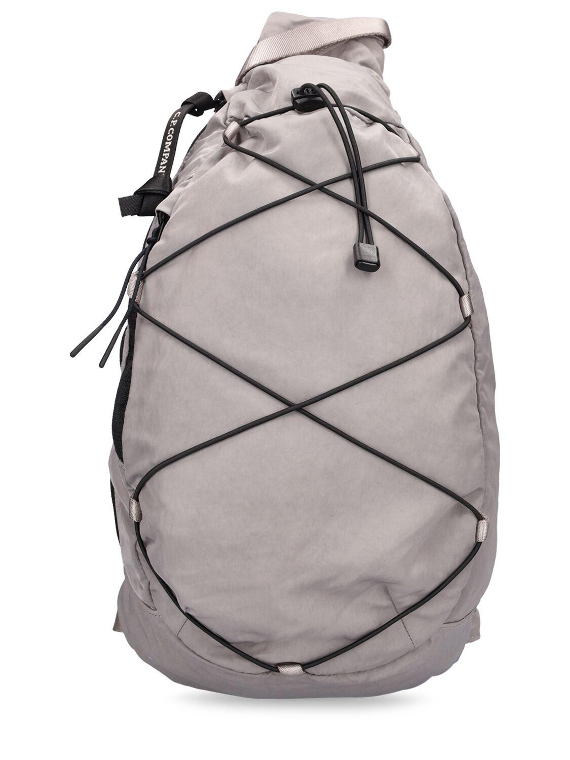 バッグ C.P. Company Nylon B crossbody backpack C.P. Company Nylon B Crossbody Backpack | Purple | FARFETCH ID