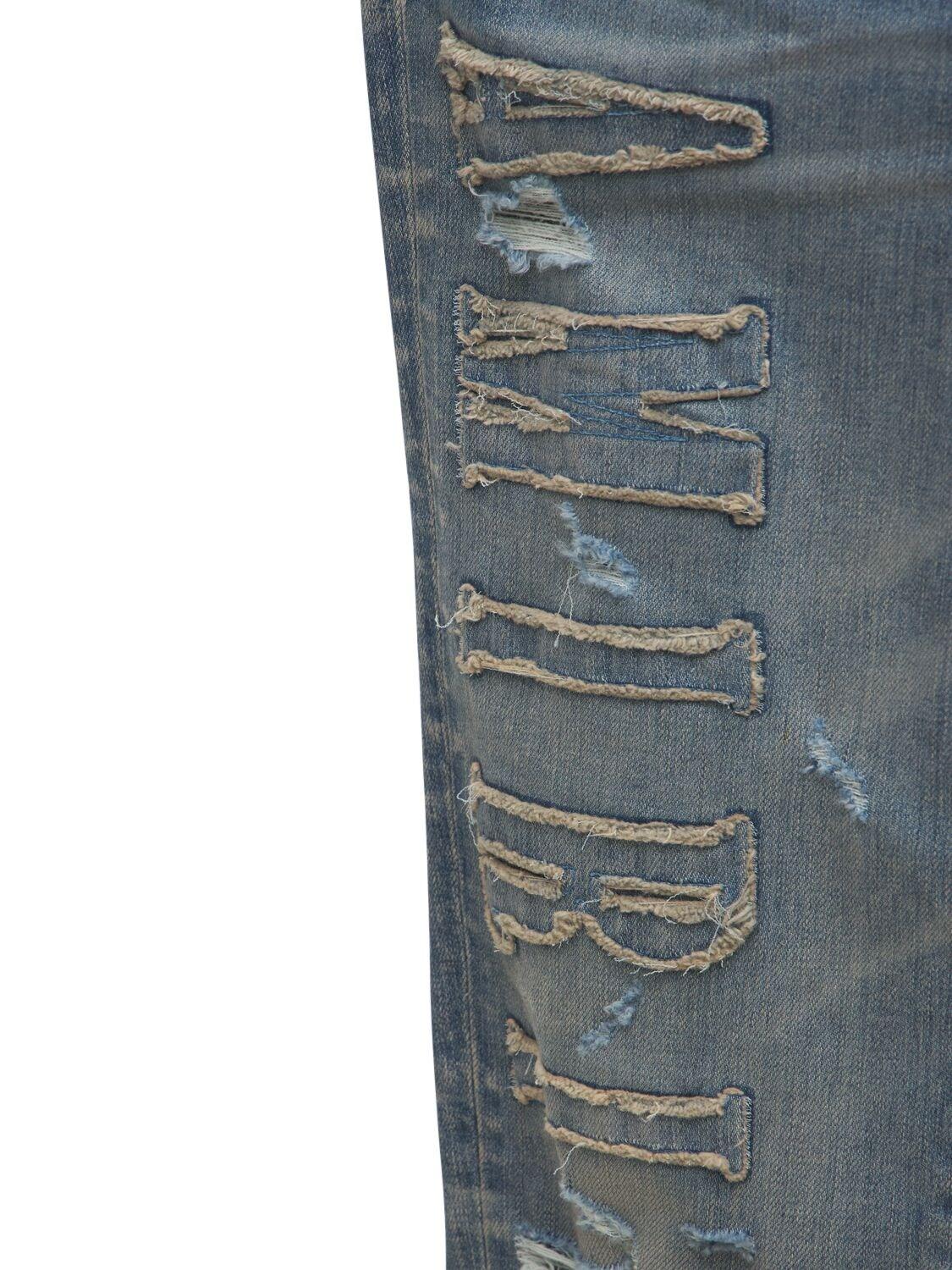 Amiri Logo Applique Cotton Denim Jeans 