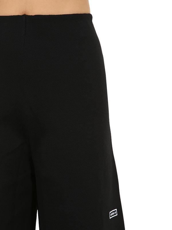 Damen Trainingshose Aus Technostoff in schwarz Damen Trainingshose Aus Technostoff in schwarz