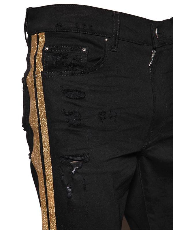 Amiri 16cm Glitter Stripes Cotton Denim Jeans in Black/Gold (Black) for ...