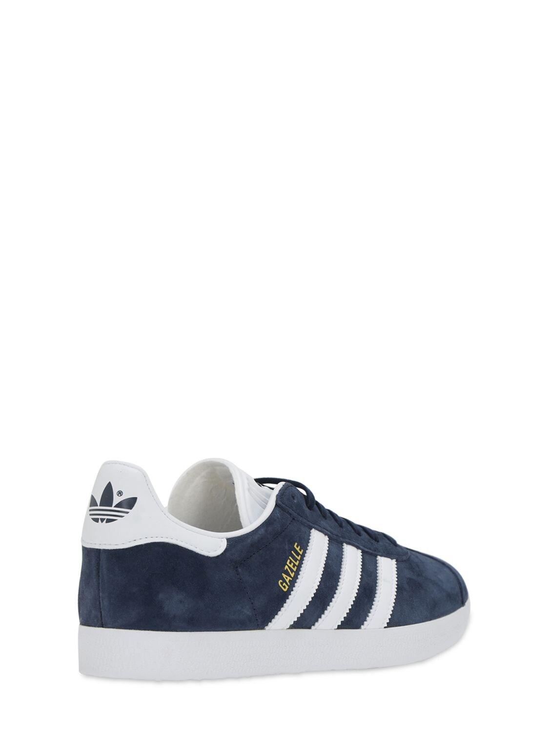 navy and gold adidas gazelle