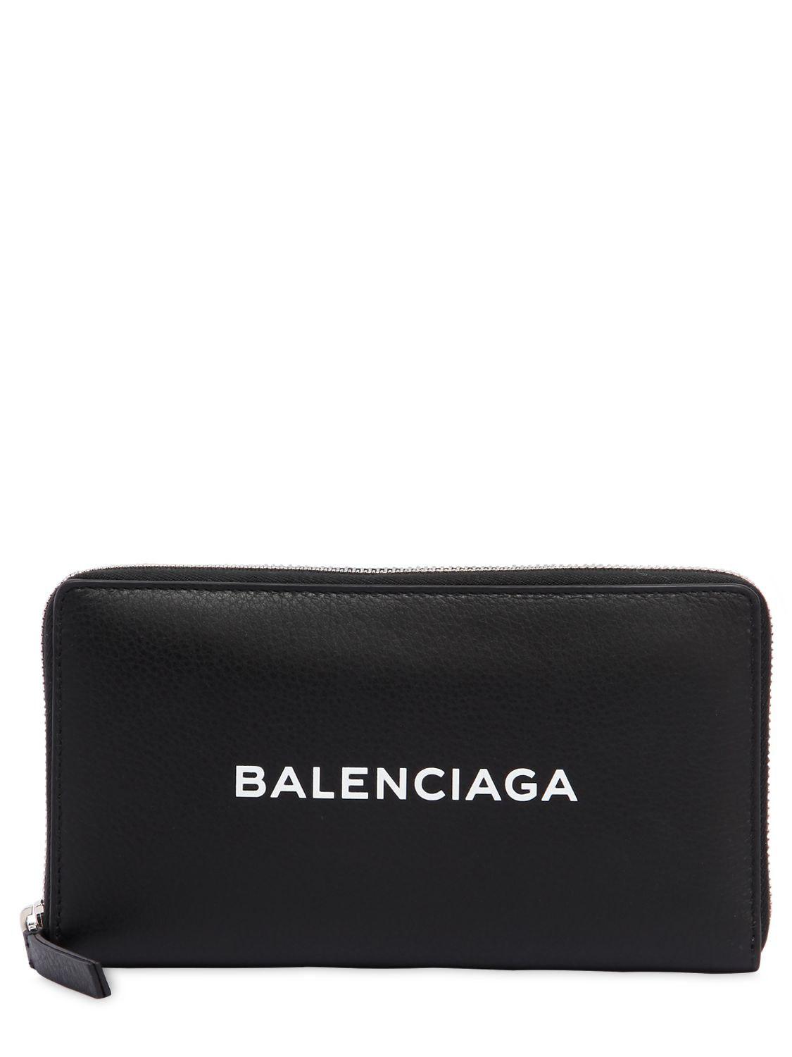 Lyst - Balenciaga Logo Printed Leather Zip Around Wallet in Black ...