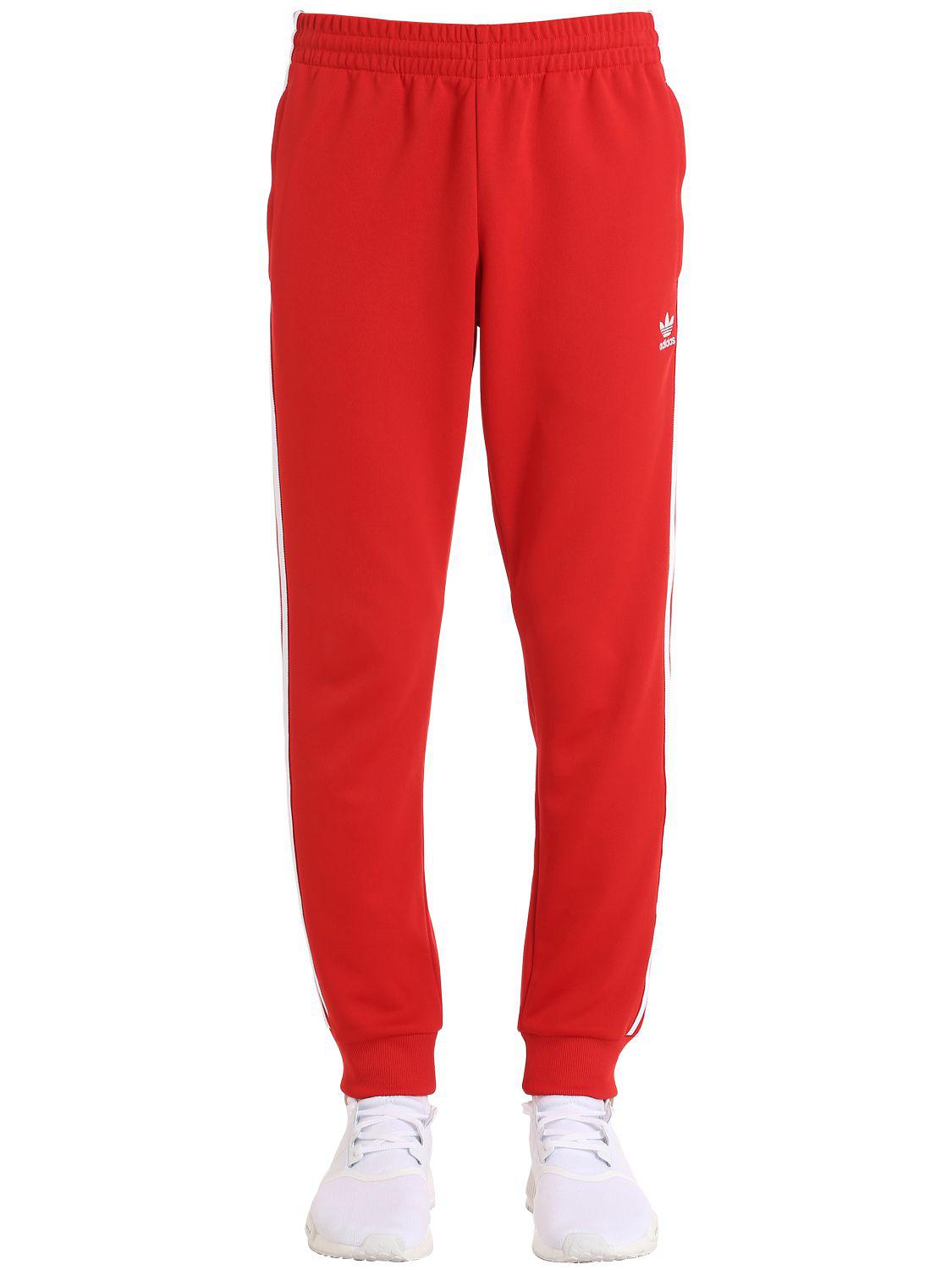 originals superstar track pants  mens red