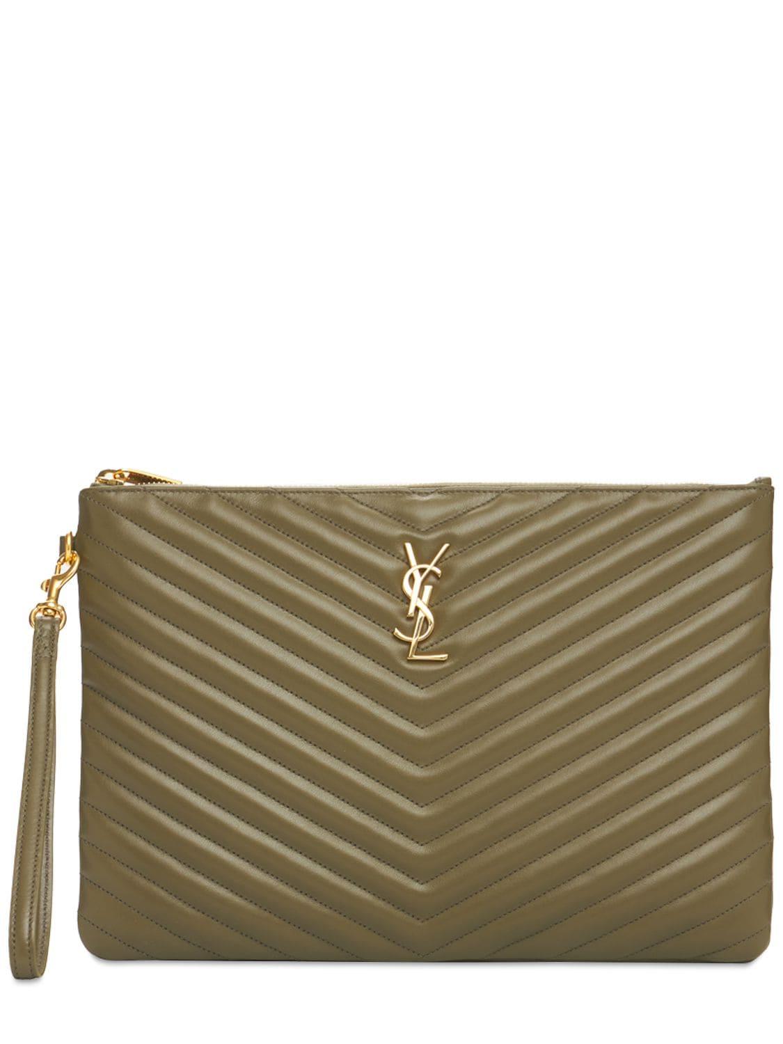niki quilted leather zip pouch at $495