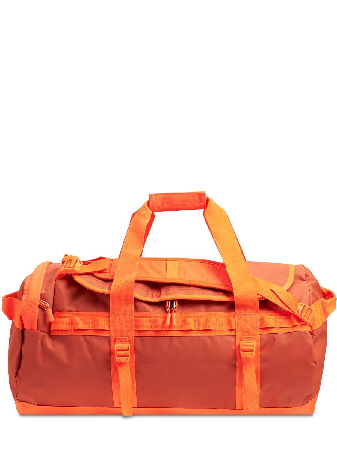 The North Face Base Camp Duffle Bag in Orange for Men | Lyst