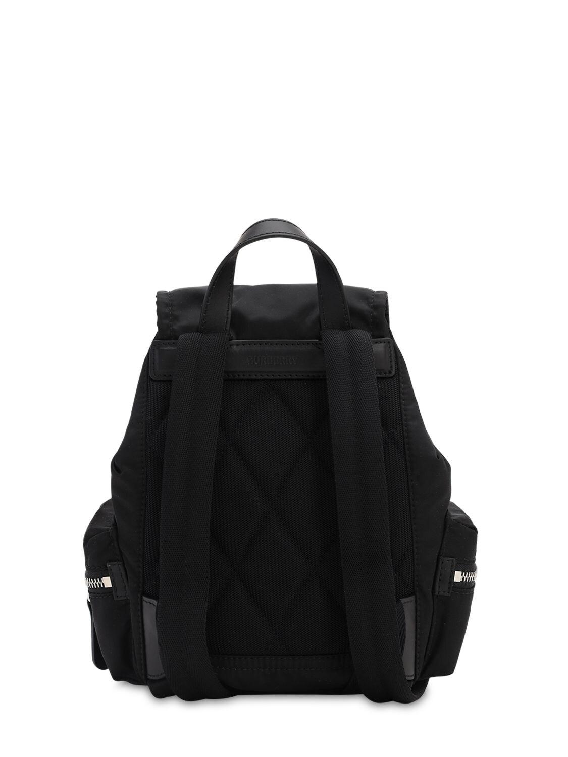 black calfskin and black nylon backpack with red detailing