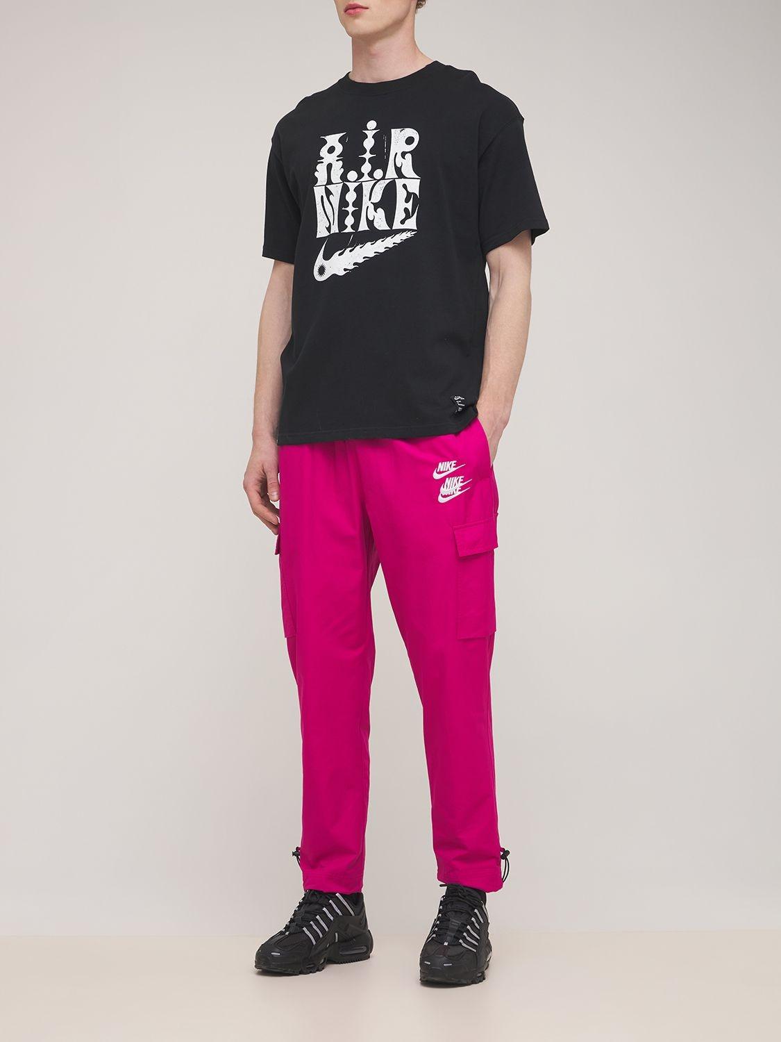 Nike World Tour Woven Cargo Pants in Fuchsia (Pink) for Men | Lyst