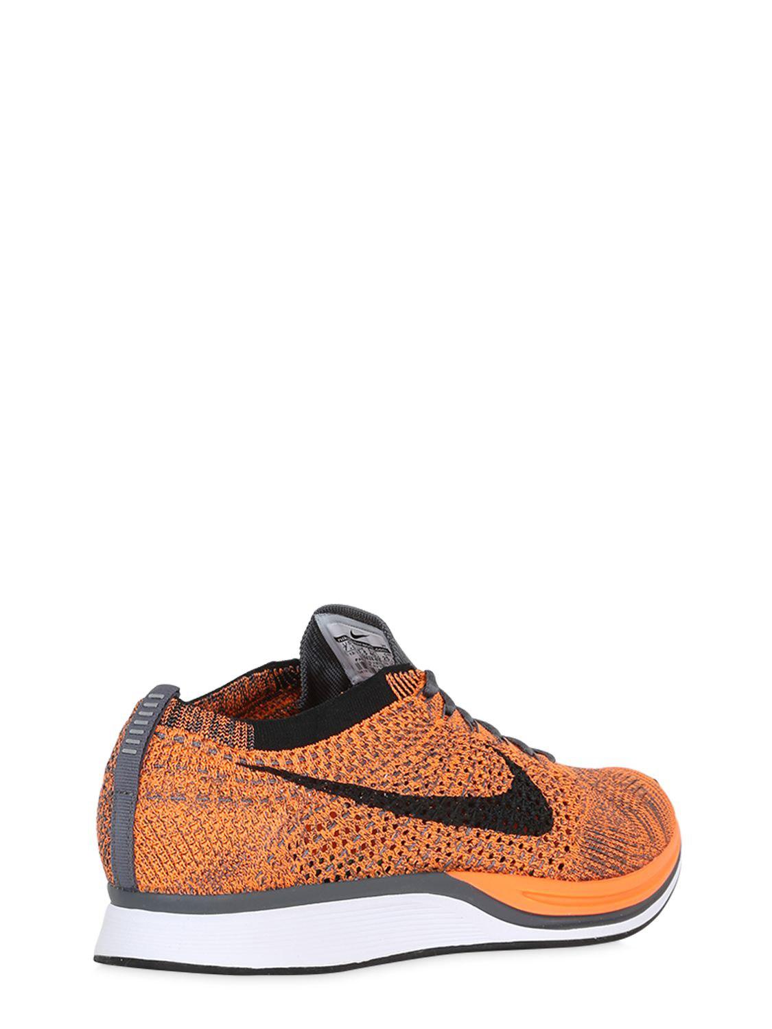nike flyknit trainer orange