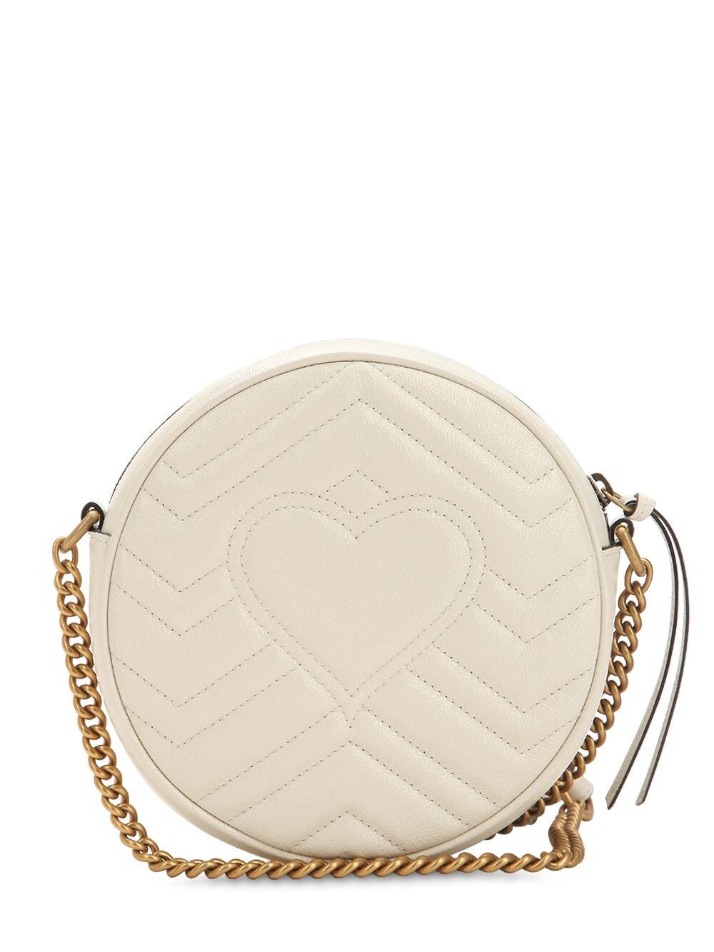 white circle gucci purse