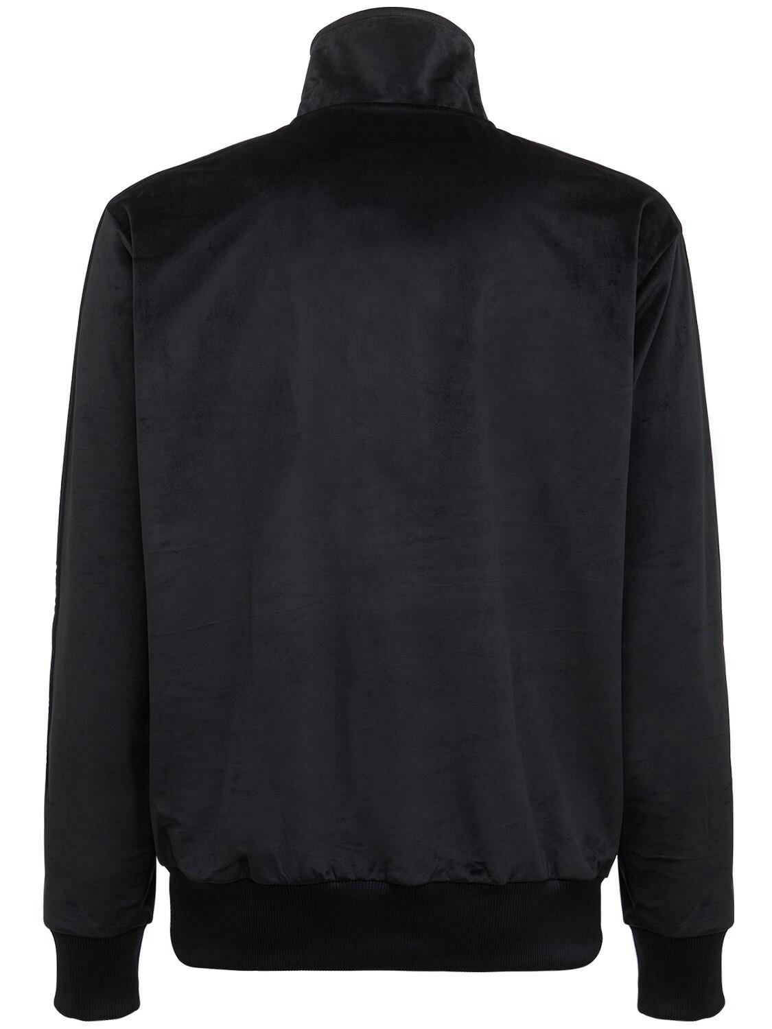 plain black track top