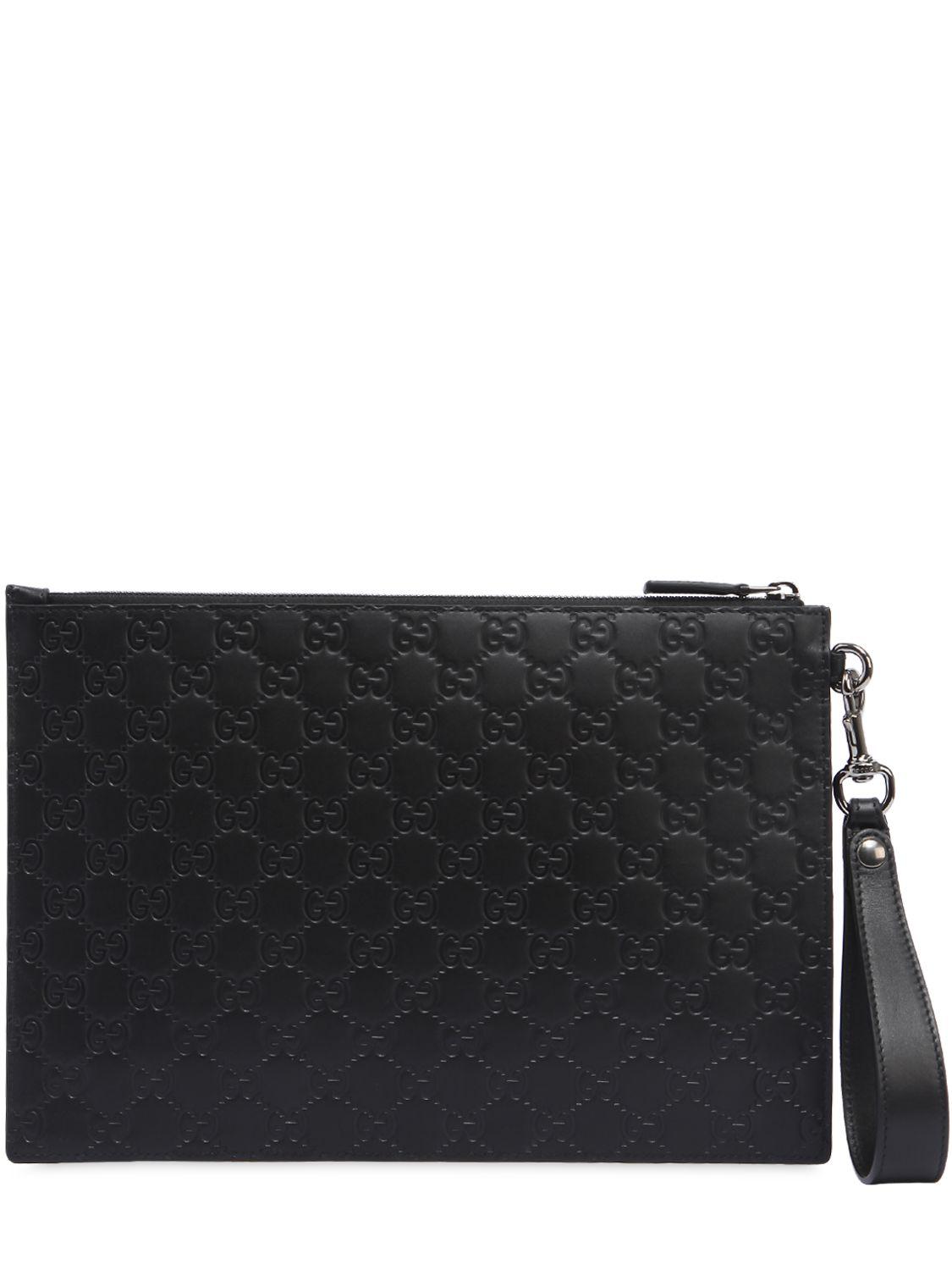 Gucci Gg Signature Embossed Leather Pouch in Black Lyst