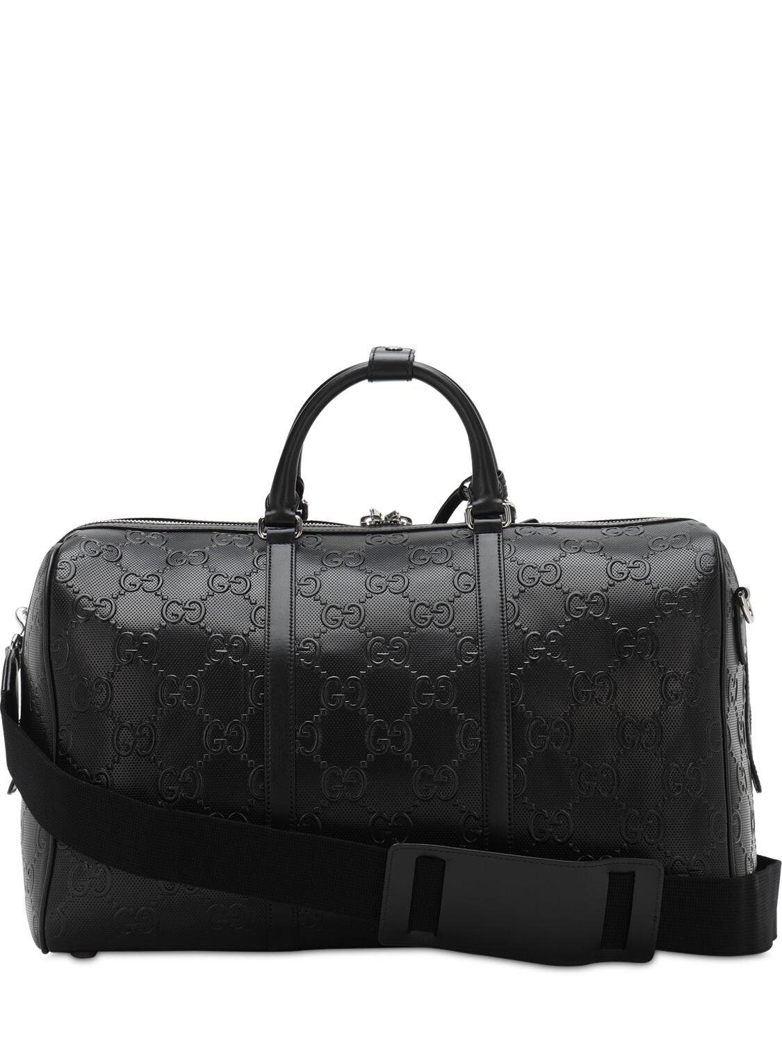 Gucci Leather GG Embossed Duffle Bag in Black for Men - Save 8% | Lyst