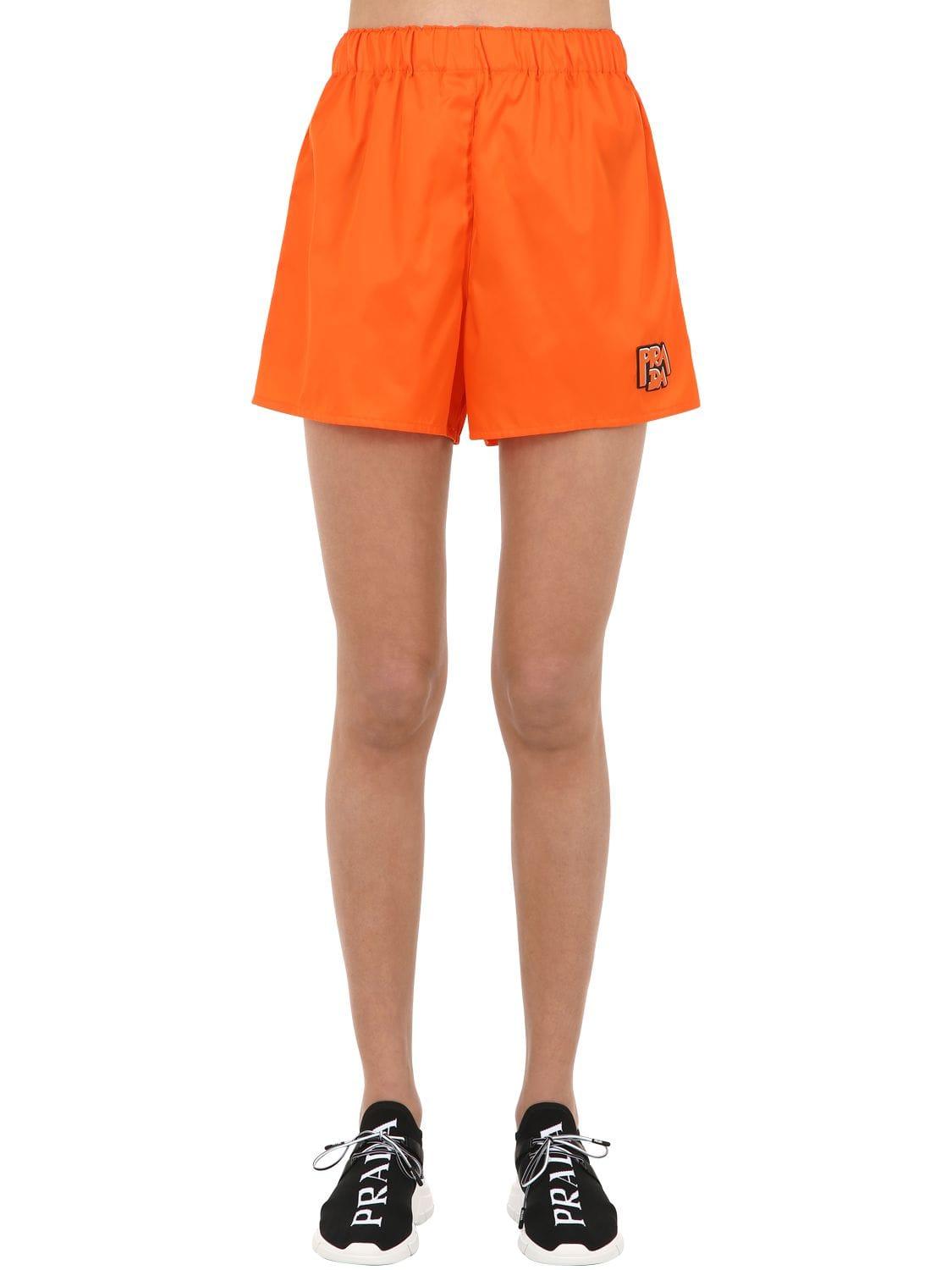 Prada Synthetic Logo Patch Nylon Shorts in Orange | Lyst