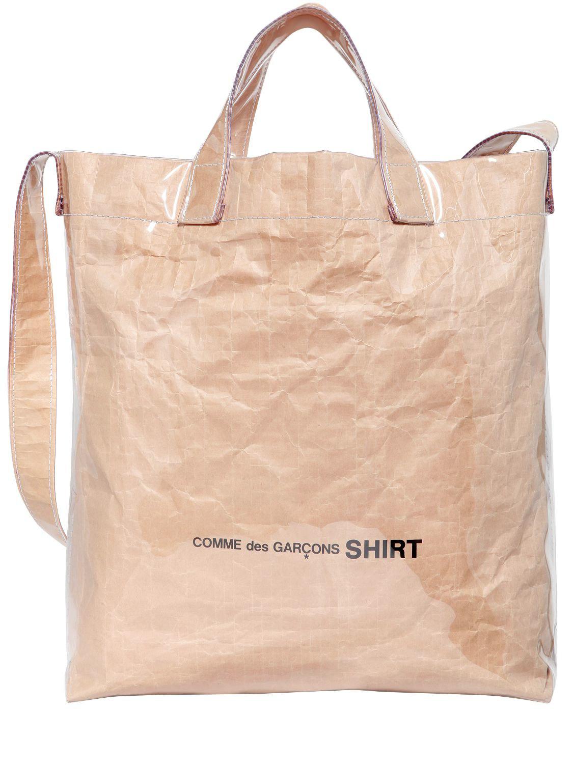 Sac tote en papier recouvert de plastique et logo Comme des Garçons en  coloris Neutre | Lyst