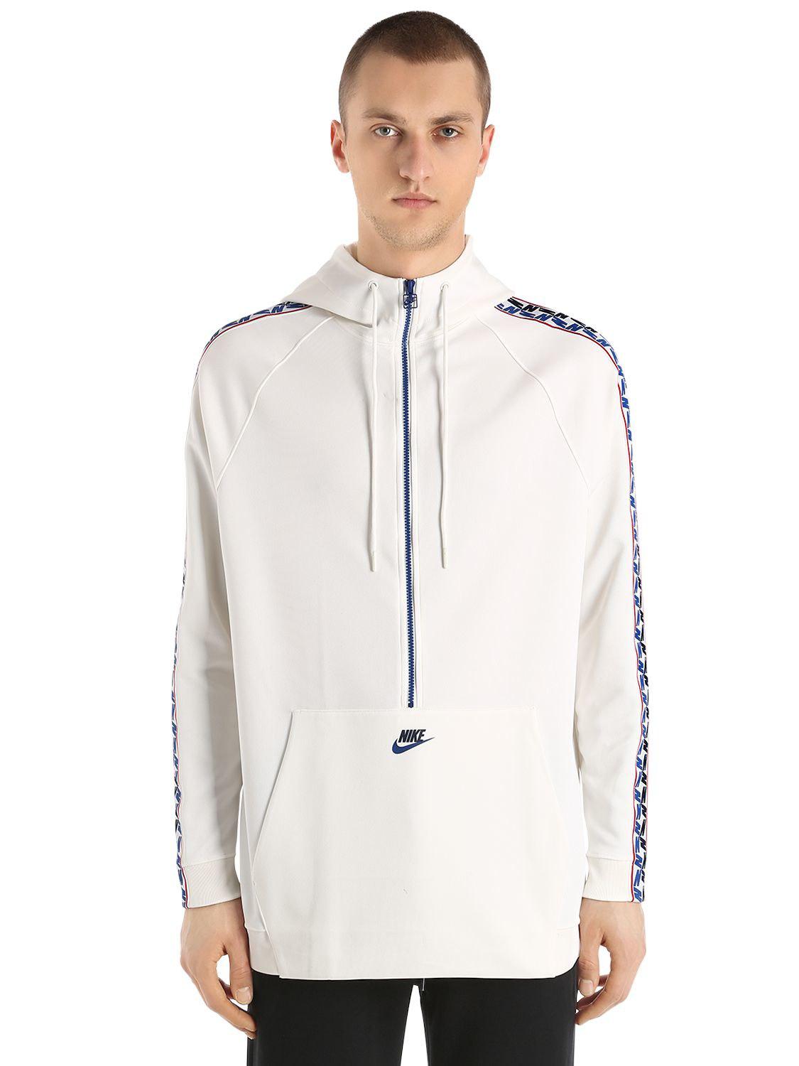 nike half zip track jacket