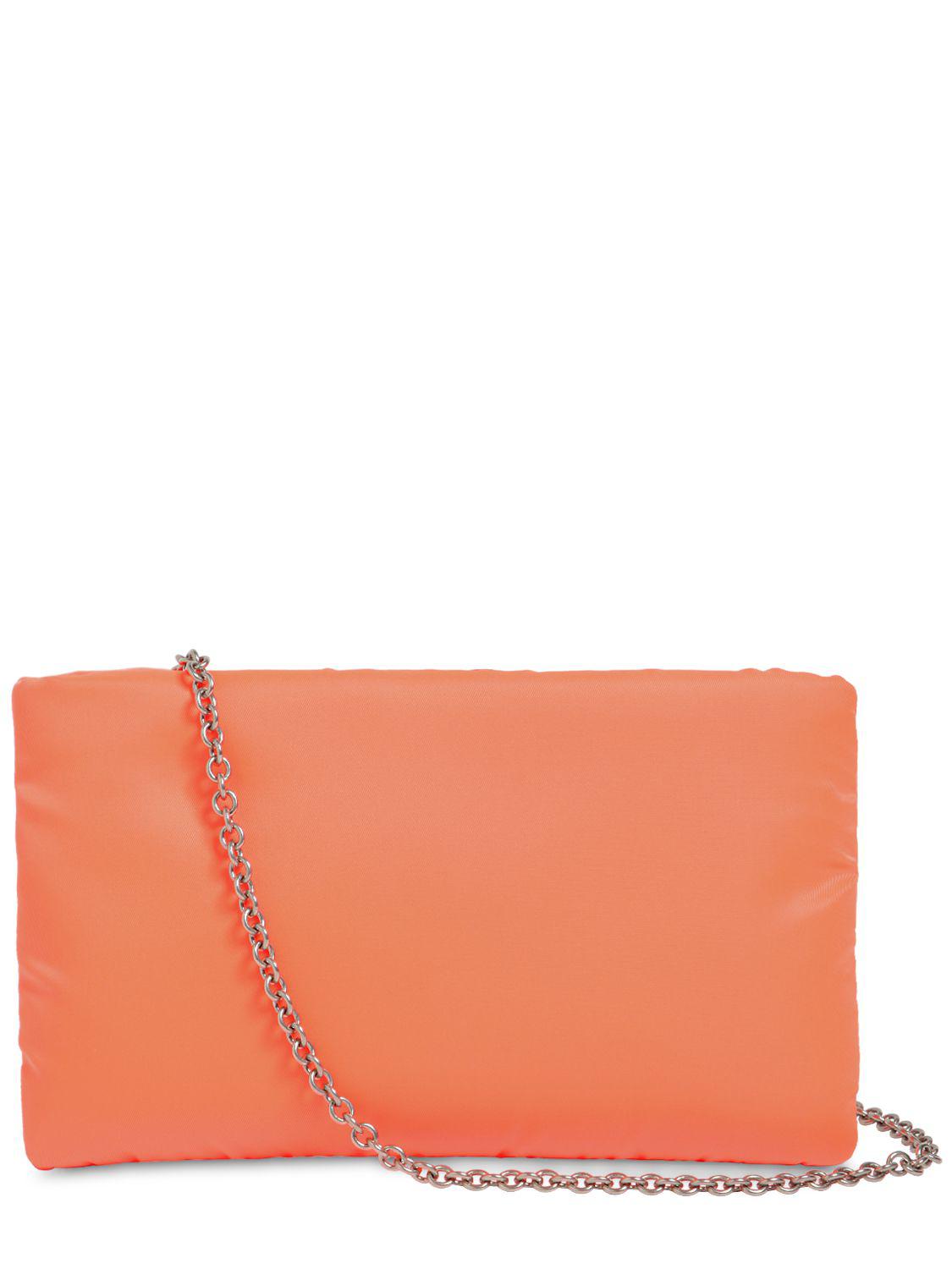 prada orange clutch