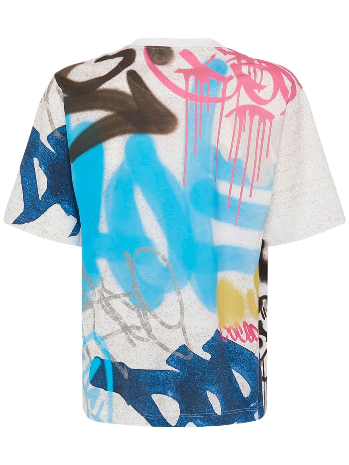 DOLCE & GABBANA - JERSEY TOP WITH GRAFFITI LOGO PRINT - Eleonora Bonucci