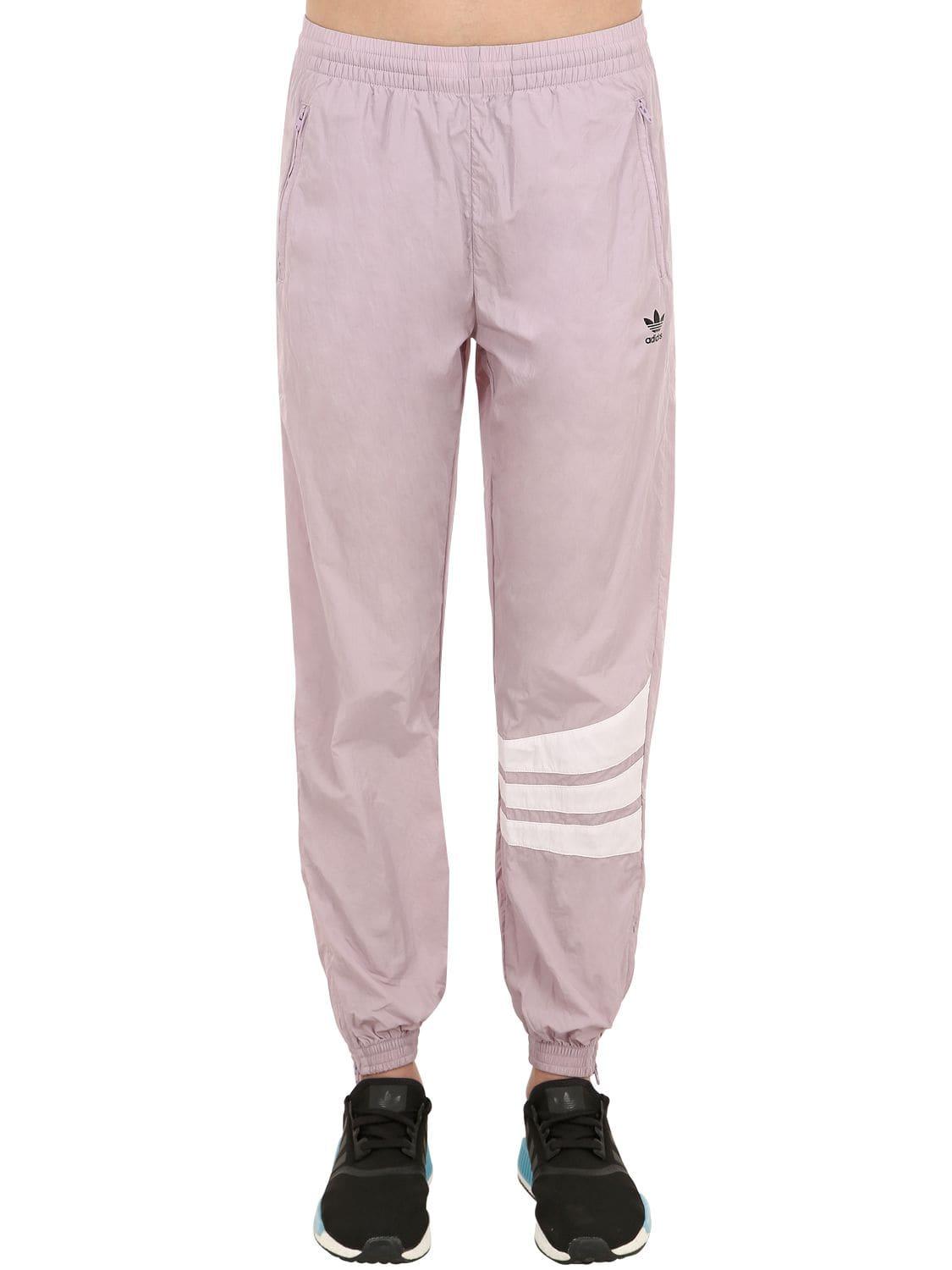 adidas Originals Striped Logo Printed Track Pants in Light Purple