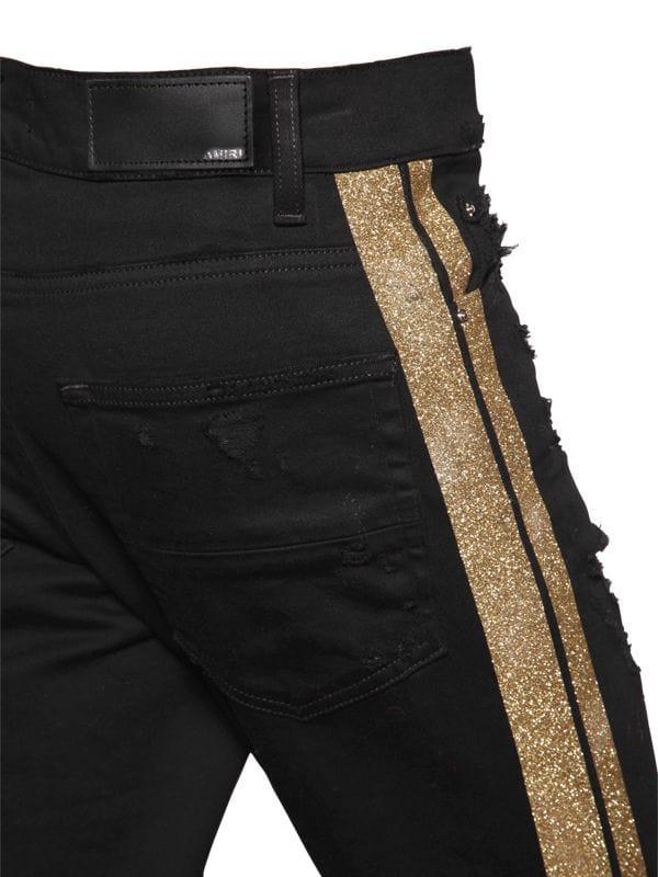 black and gold amiri jeans