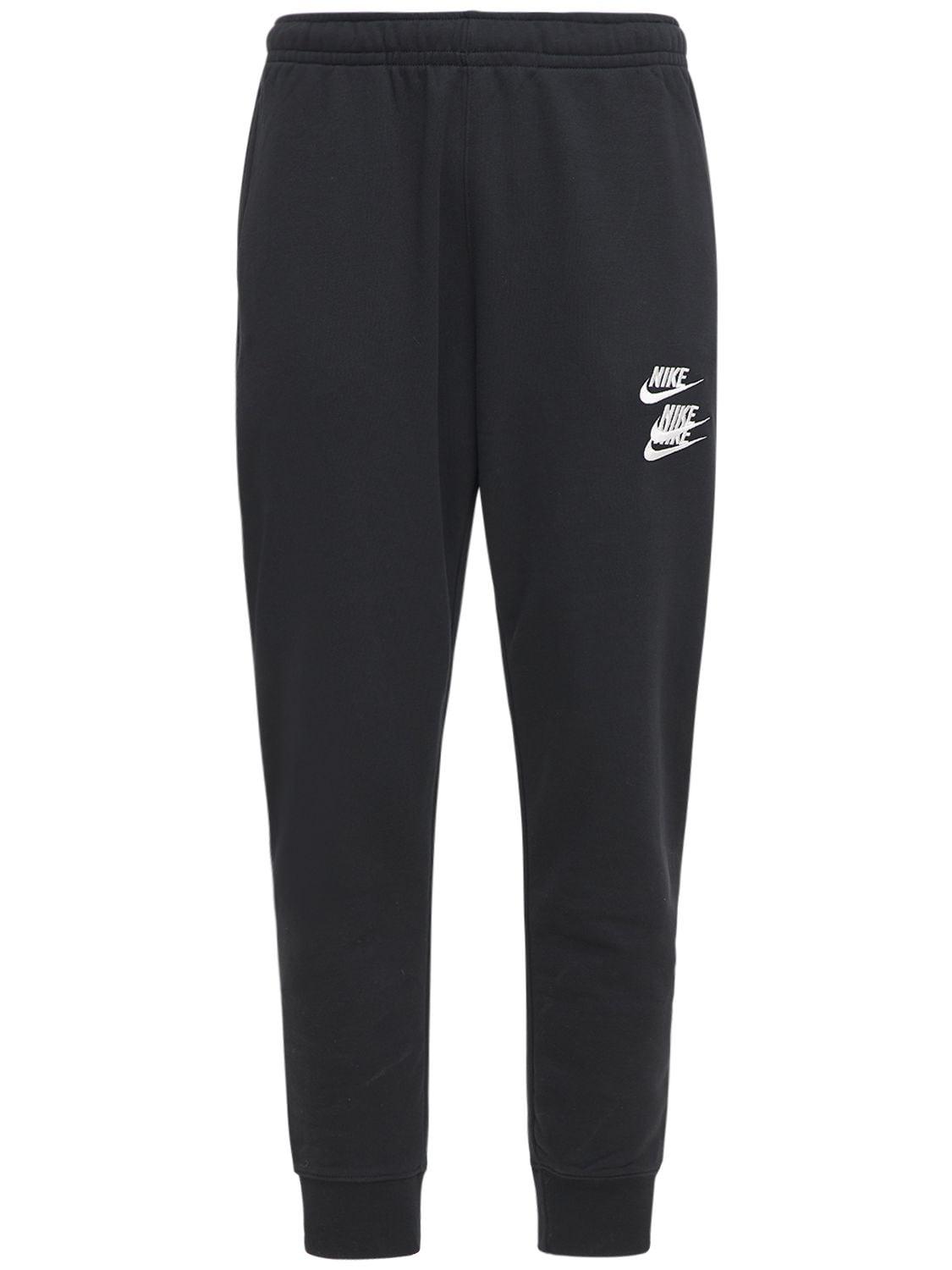 Nike World Tour Jogger Pants in Black for Men | Lyst