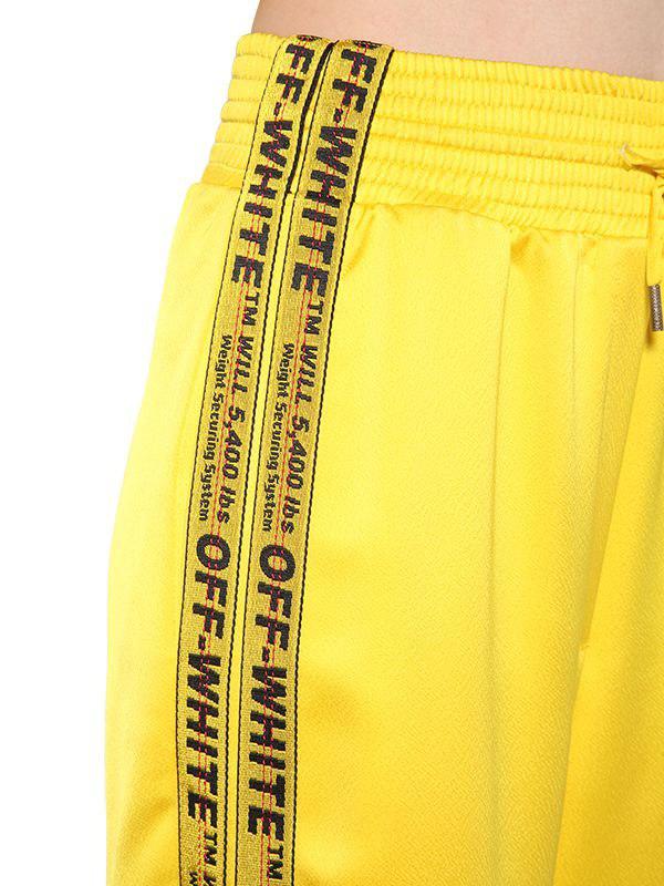 pantalon off white bande jaune