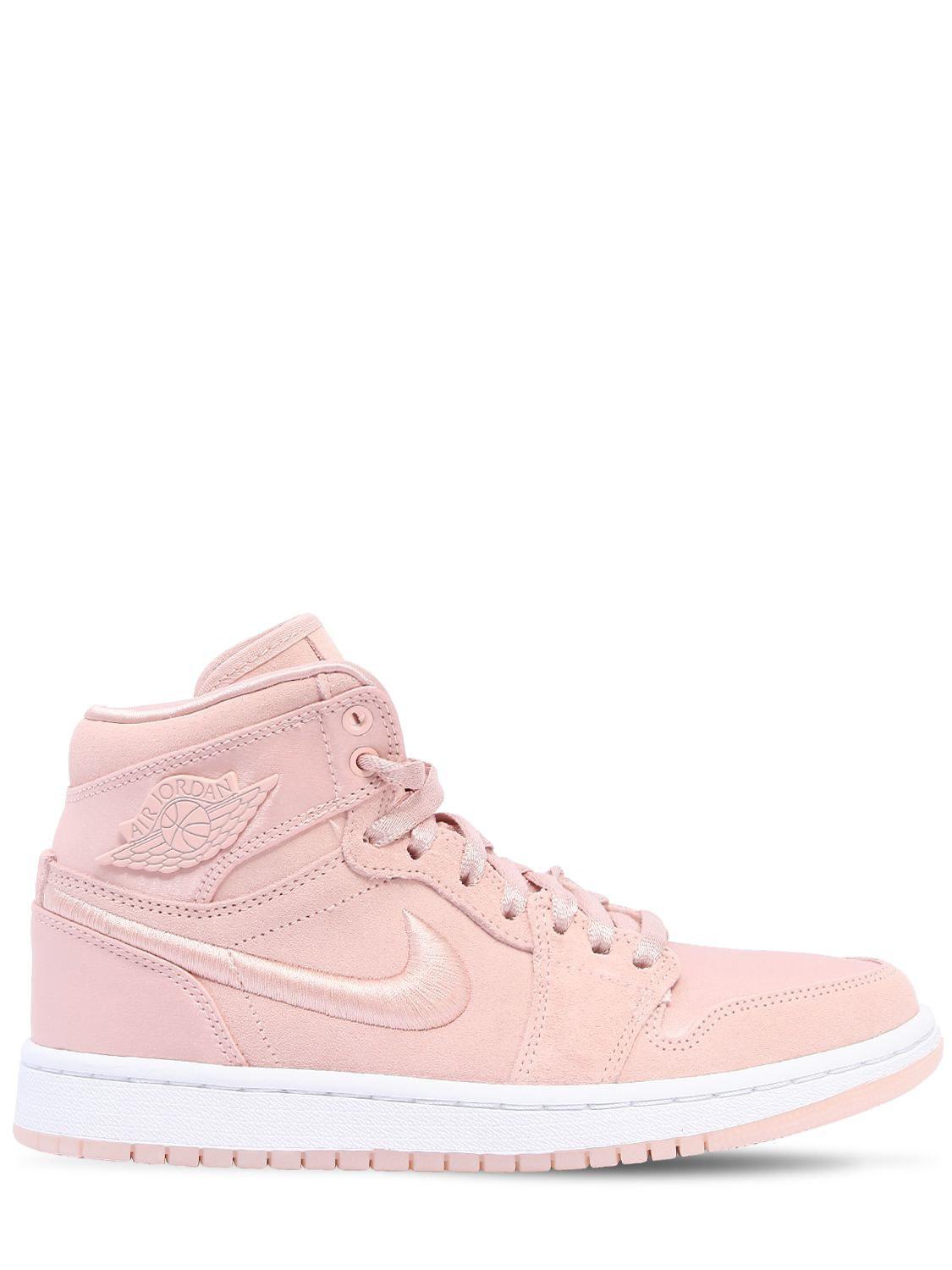 Nike Air Jordan 1 Retro High Top Sneakers in Pink | Lyst