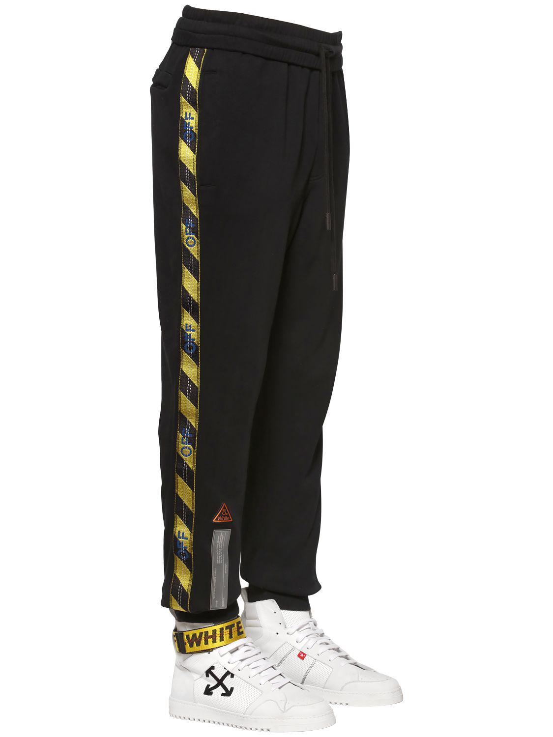 Off-White c/o Virgil Abloh Fire Line Tape Cotton Sweatpants in Black for Men - Lyst