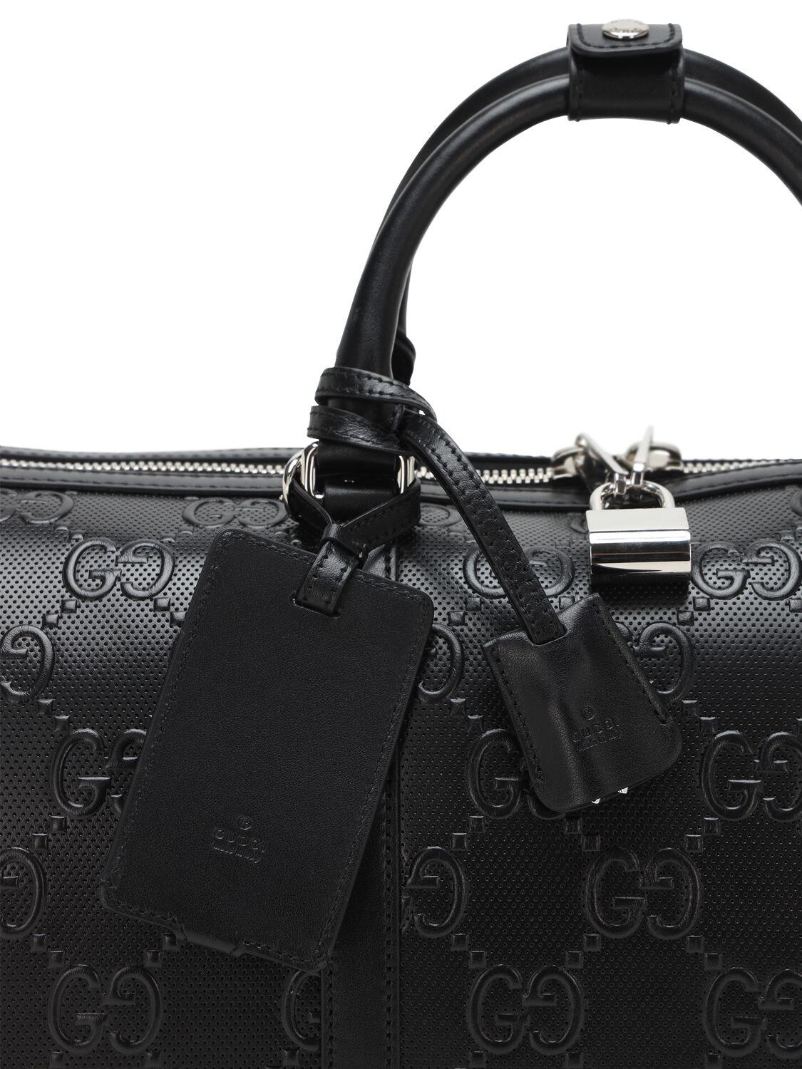 GUCCI GUCCISSIMA BLACK EMBOSSED LEATHER DUFFLE BAG – Caroline's Fashion  Luxuries