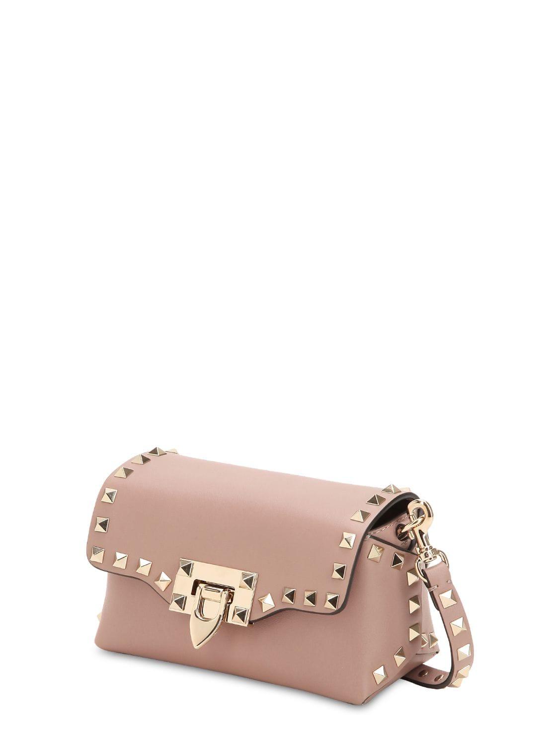 Mini rockstud calfskin crossbody bag deals