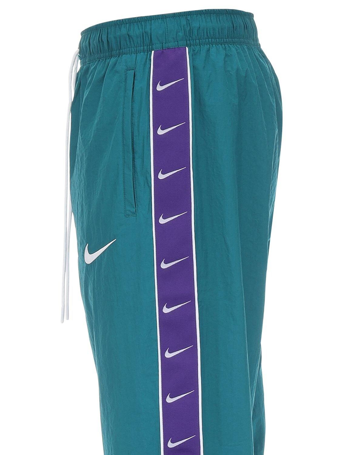 Nike Nsw Swoosh Woven Nylon Pants in Teal/Purple (Blue) for Men | Lyst