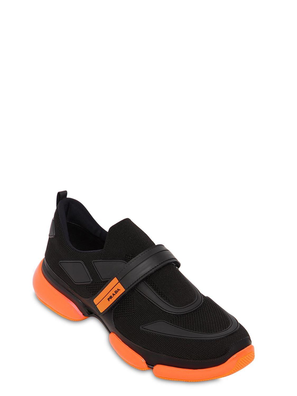 black and orange prada cloudbust