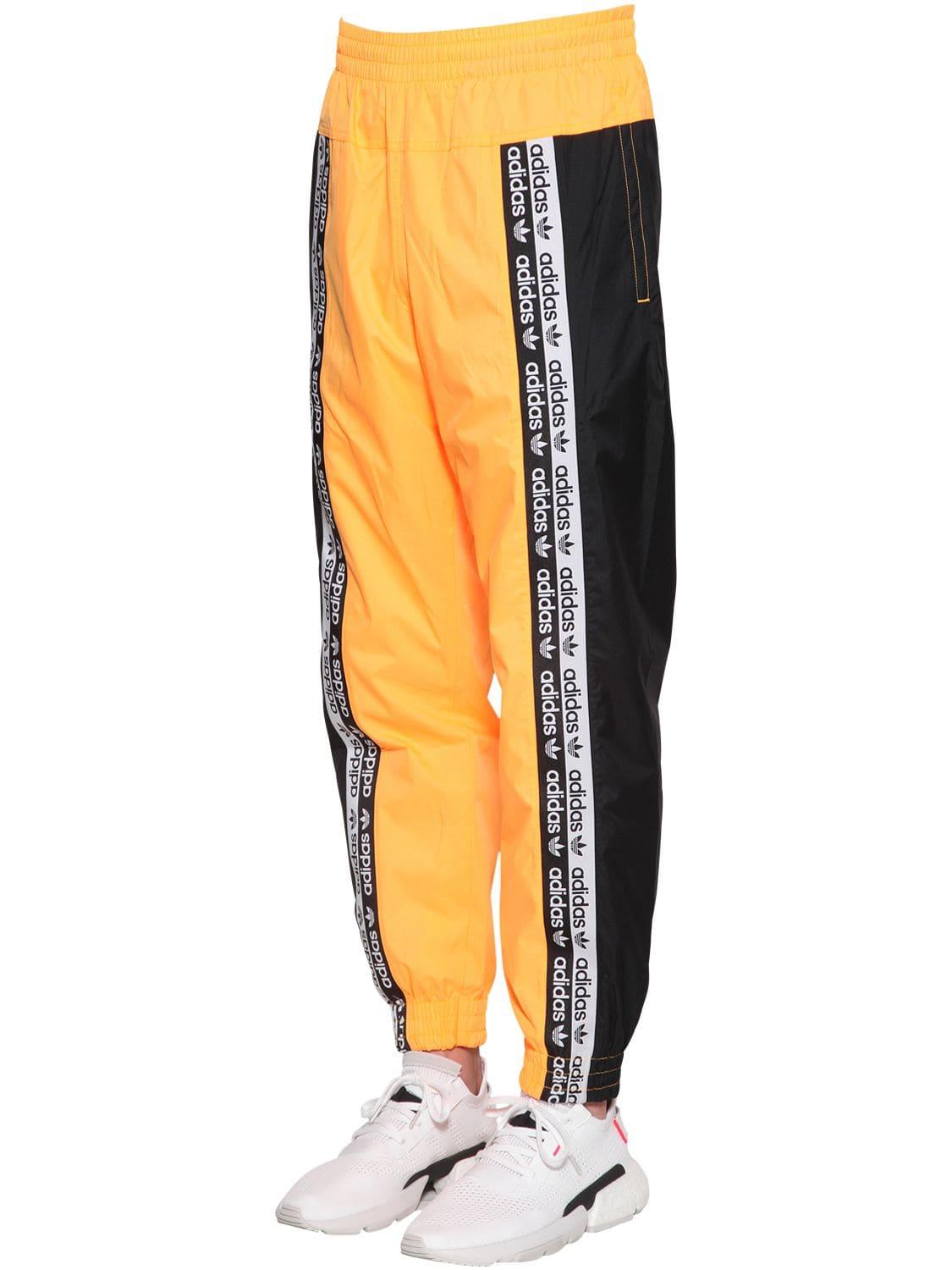 adidas Originals Synthetic Vocala Tp Nylon Track Pants in Orange for Men -  Lyst
