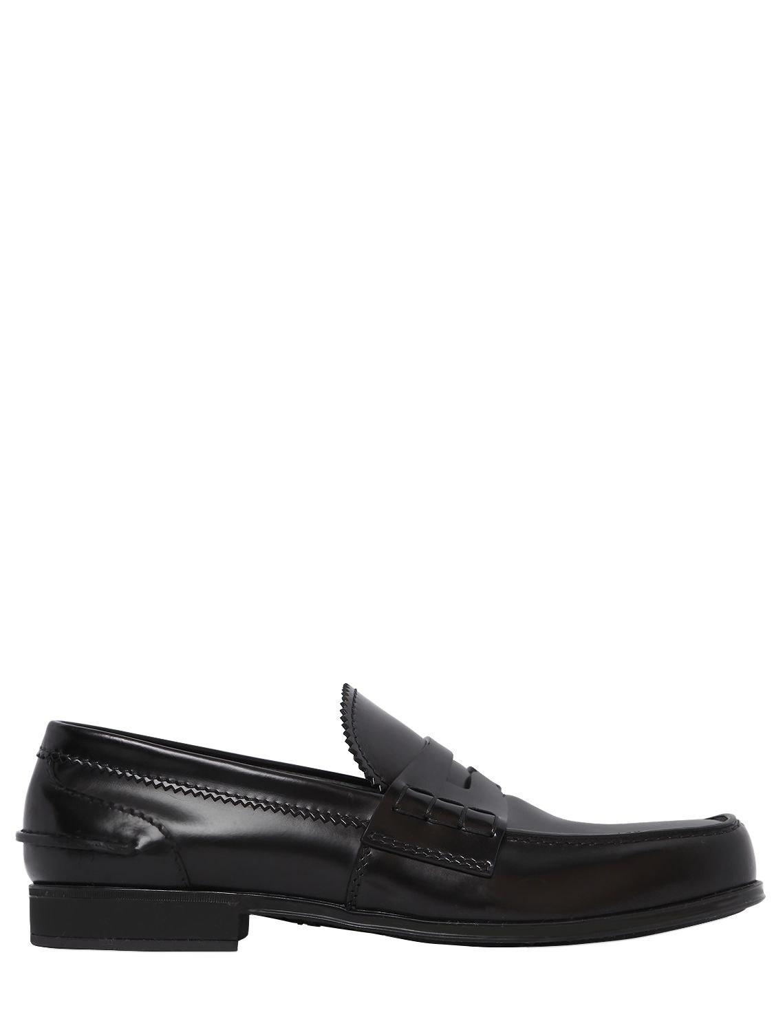 Prada Brushed Leather Penny Loafers in Black for Men - Lyst