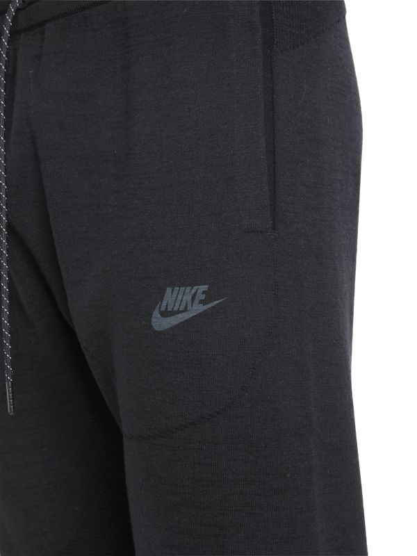 Nike Tech Flyknit Jogging Trousers in Black for Men - Lyst