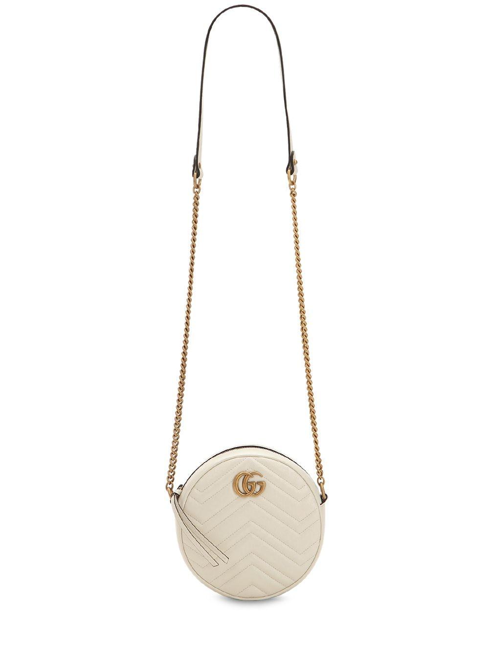 white circle gucci purse