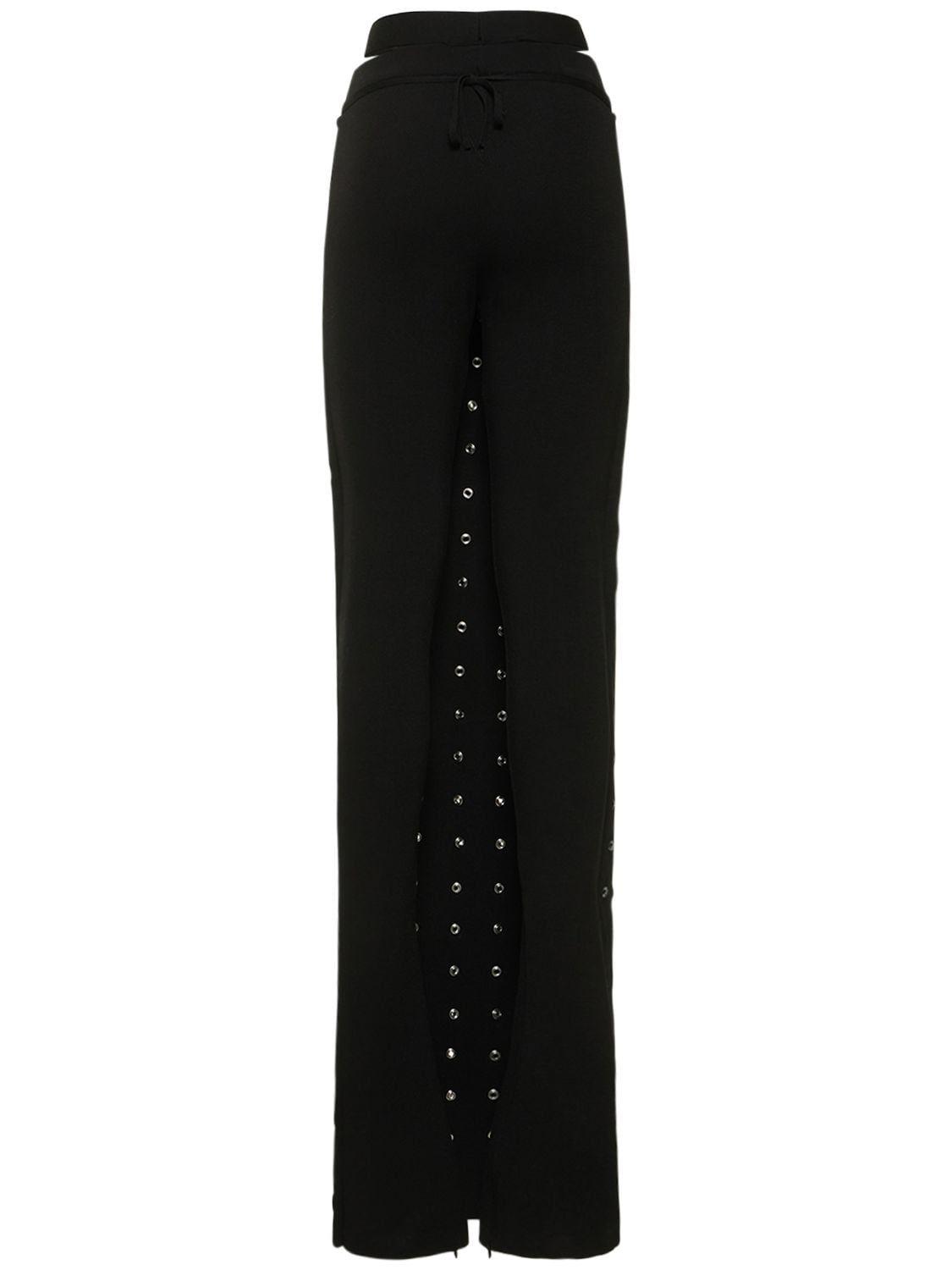 ANDREĀDAMO cut-out ribbed-knit Flared Trousers - Farfetch