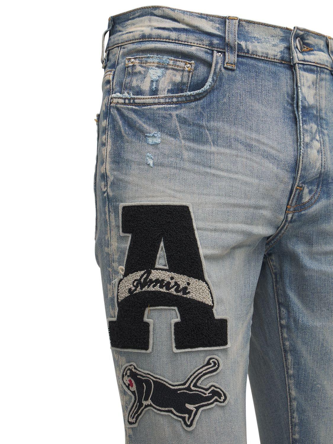 Amiri Varsity Patch Denim Jeans in Blue for Men - Lyst