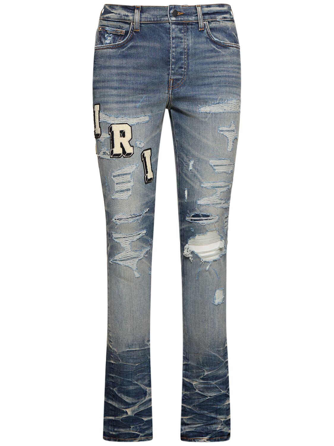Amiri Skinny-fit Logo-appliquéd Distressed Jeans in Blue for Men