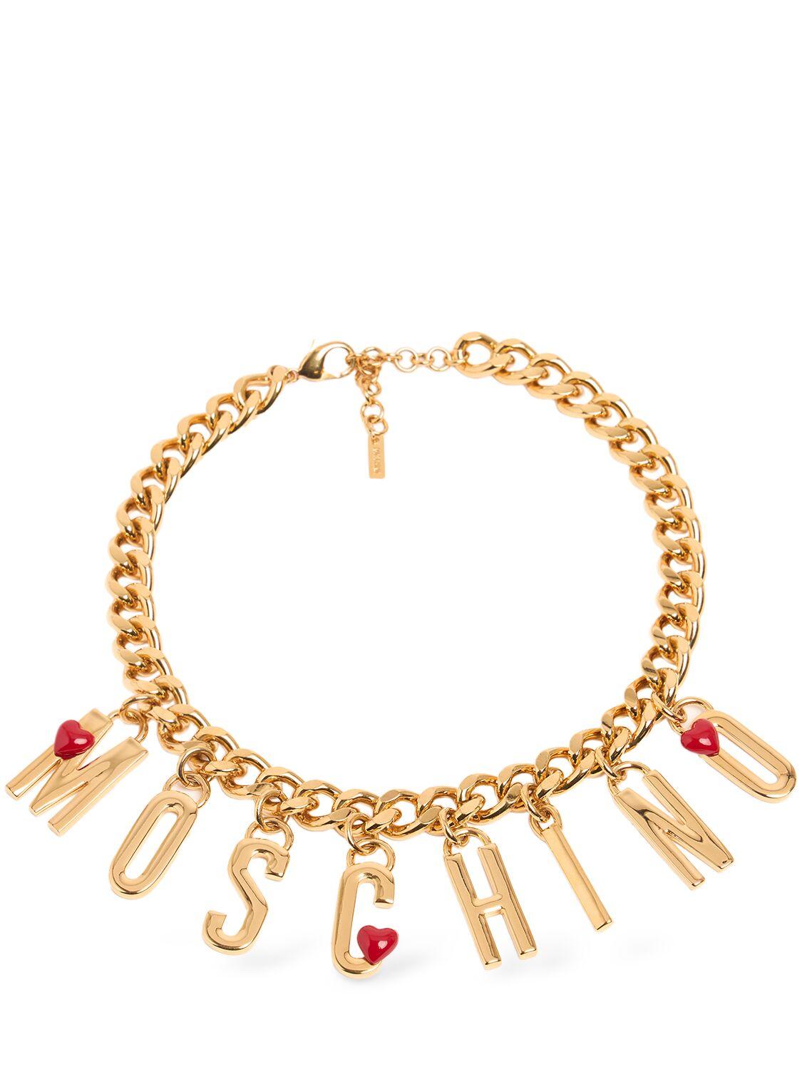 【送料&関税込】Moschino Logo Lettering Charm Detailed Neckl Moschino Logo Lettering Charm Collar Necklace in Metallic