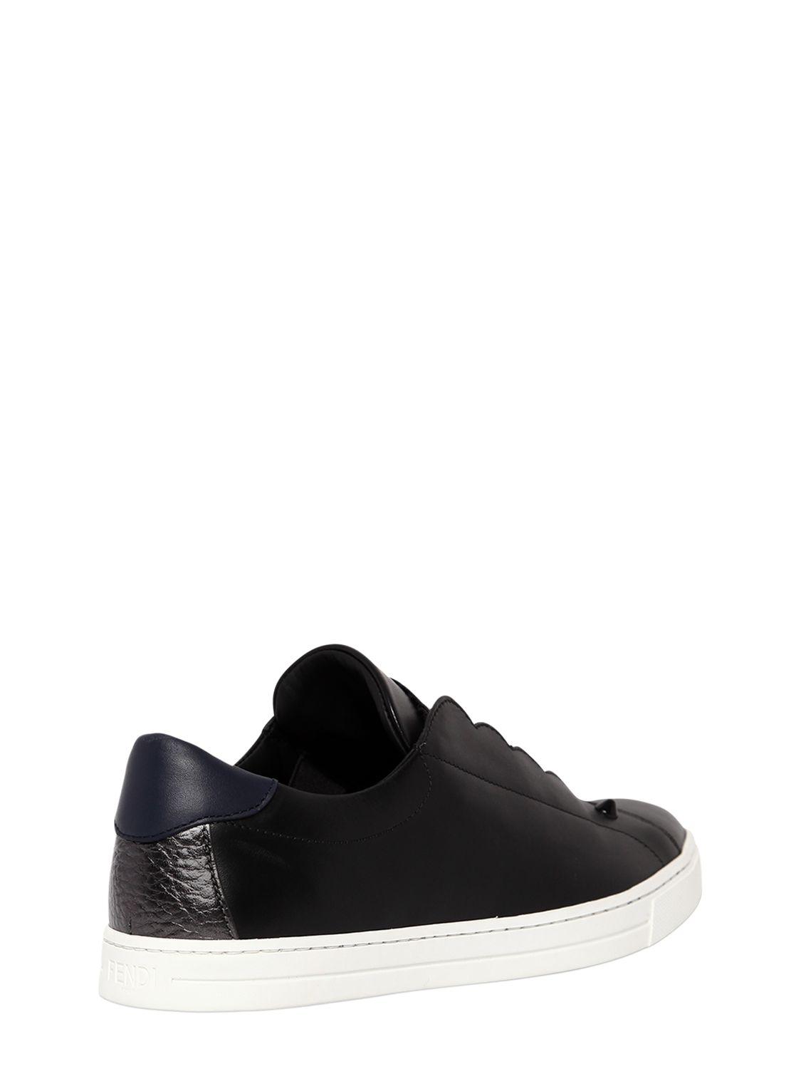 slip on sneakers black leather
