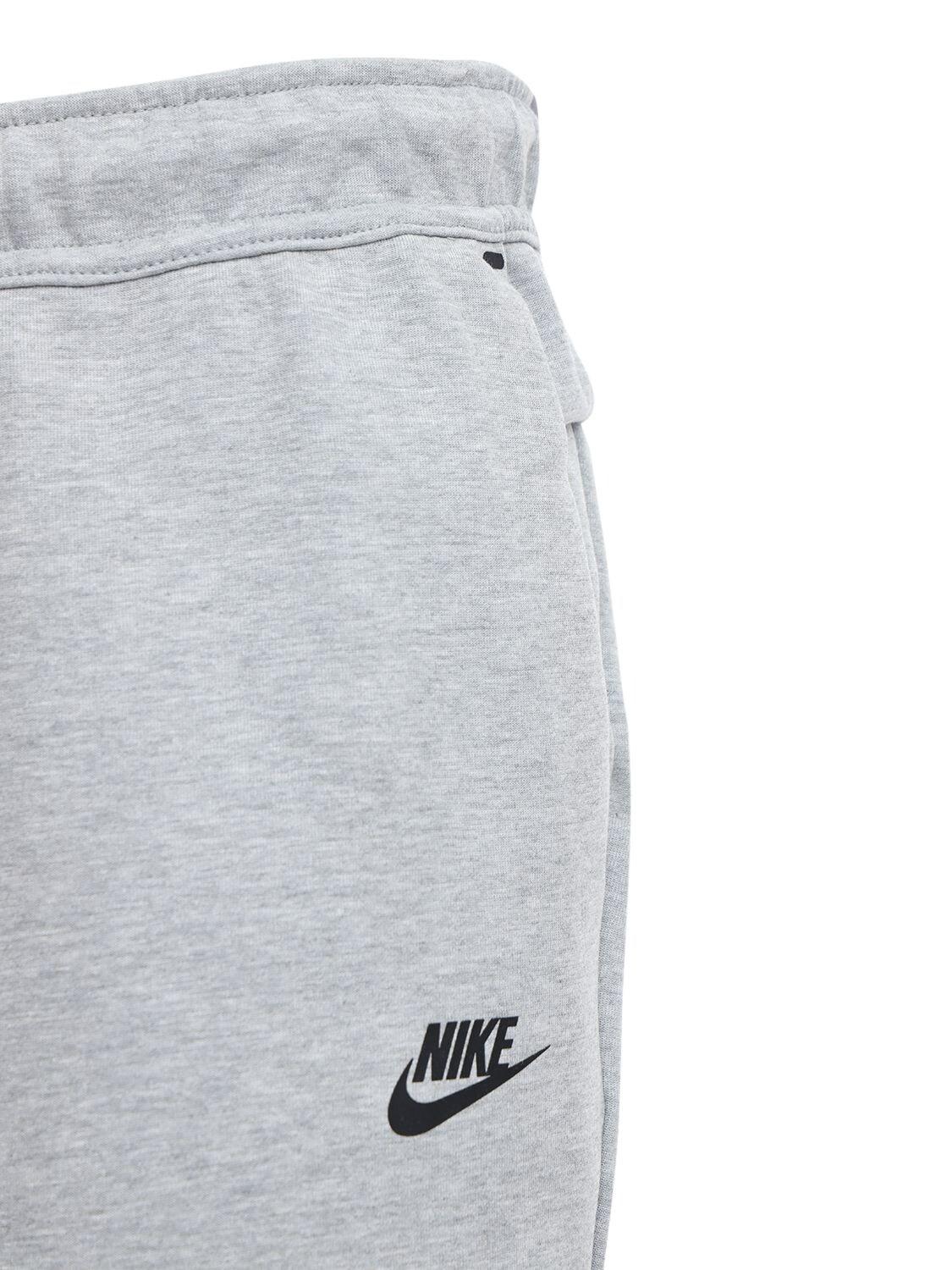 nike tech grey shorts