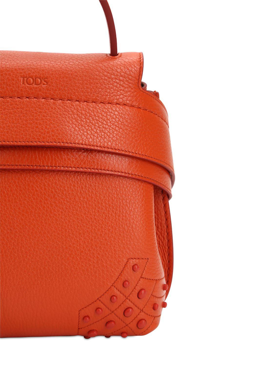 Tod's Mini Wave Gommino Leather Backpack in Orange | Lyst