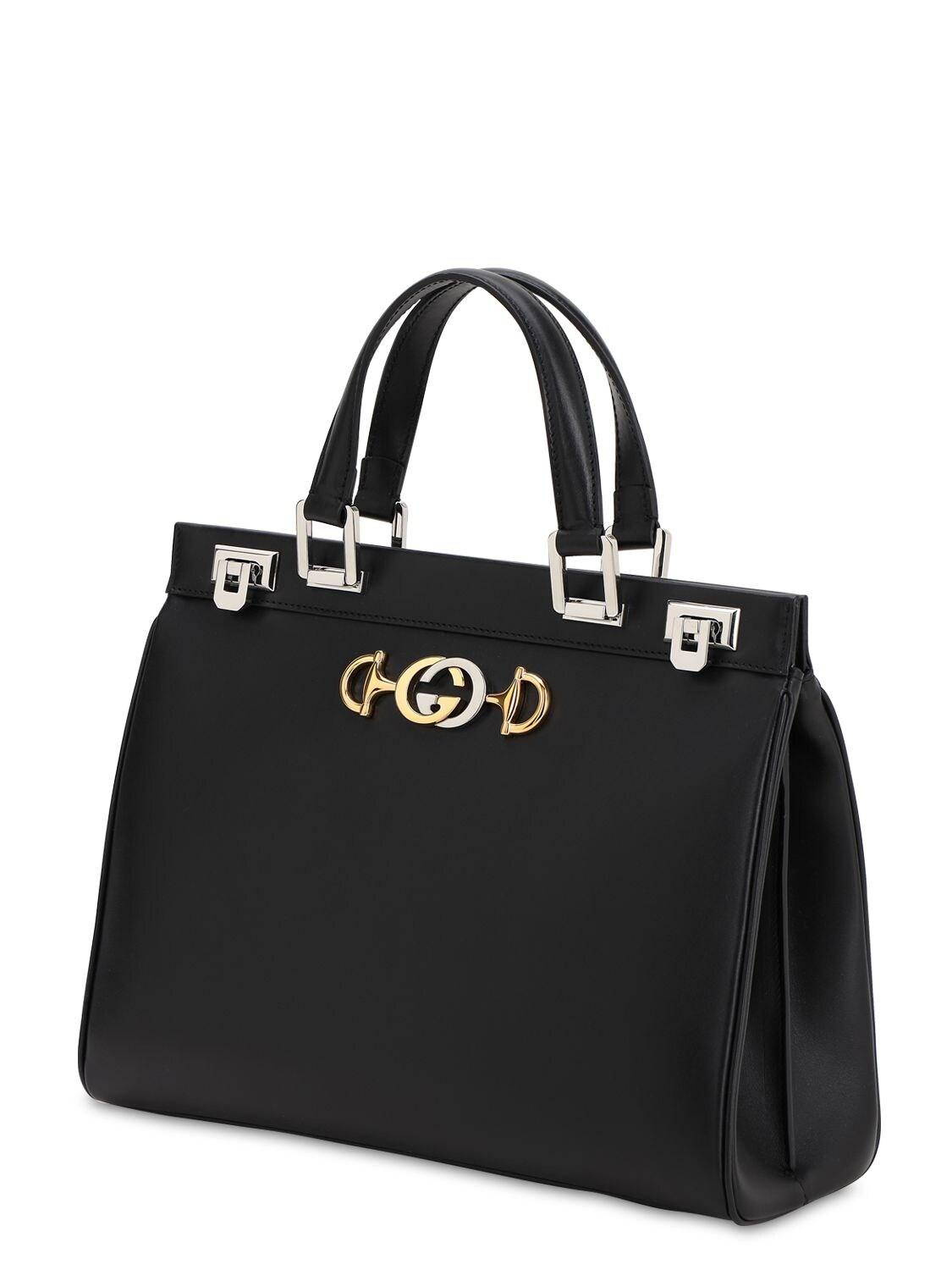 ladies zumi grainy leather medium top handle bolsa in black