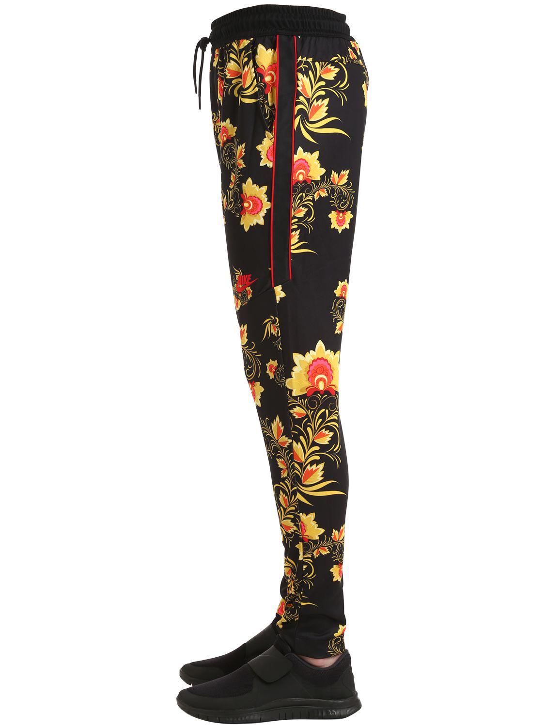 nike floral track pants