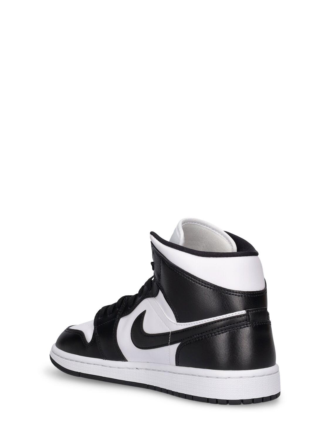 Nike Air Jordan 1 Mid Sneakers in Black Lyst UK