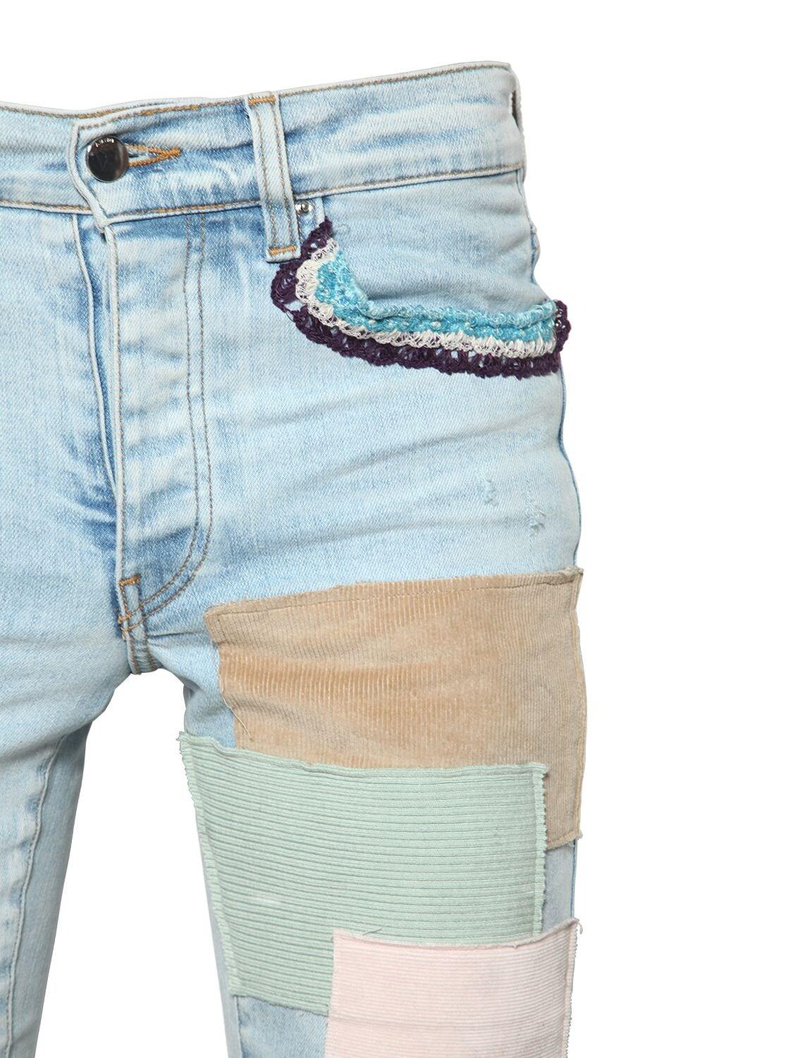 amiri 15cm patchwork cotton denim jeans