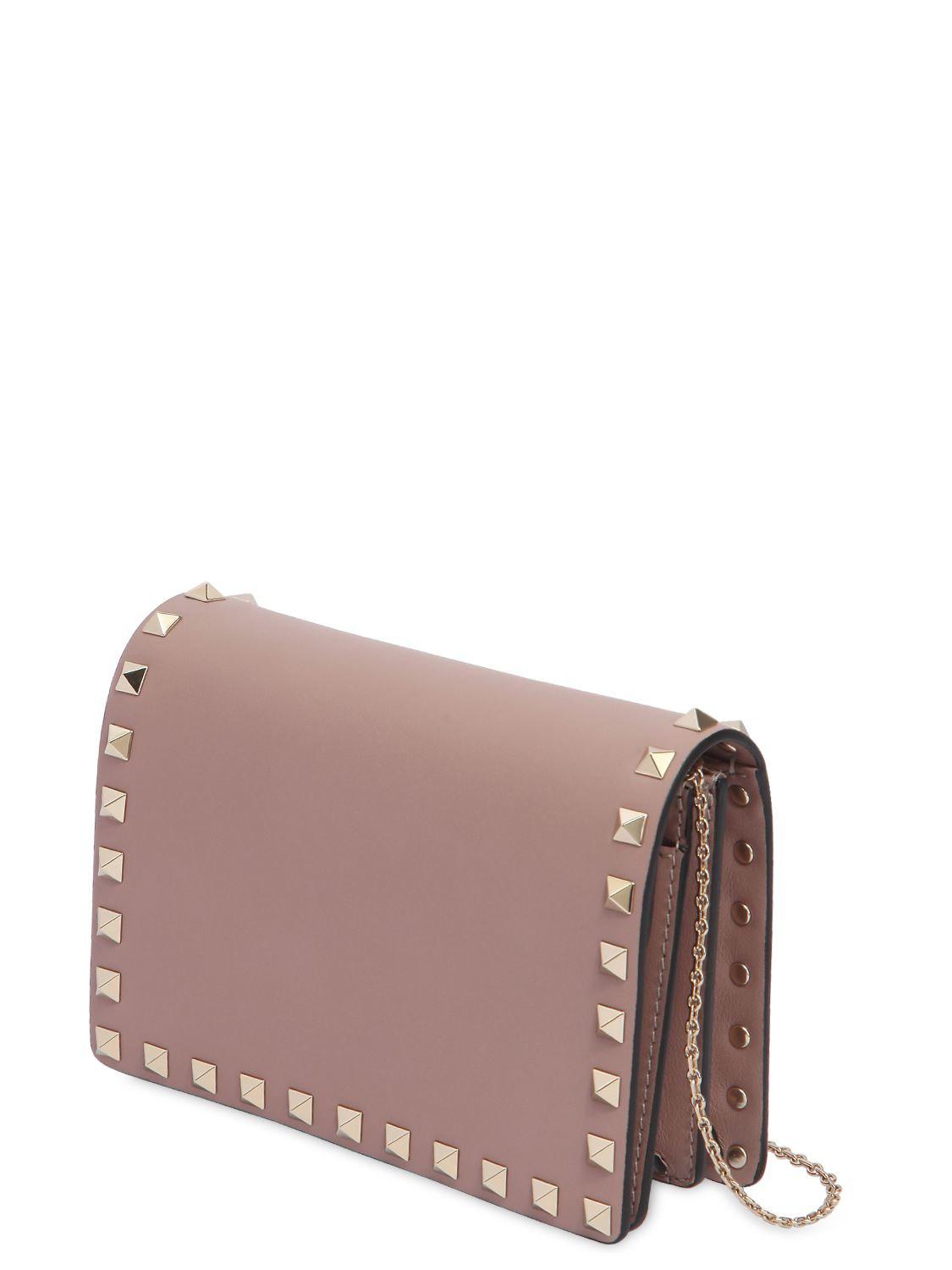 valentino rockstud clutch pink