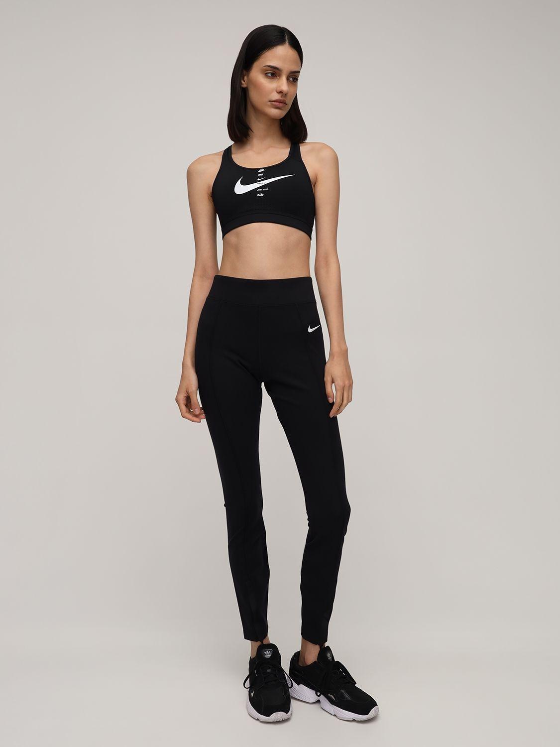 Buy Nike Women's Dri-FIT Indy Light-Support Padded Sports Bra (Plus Size)  White in KSA -SSS