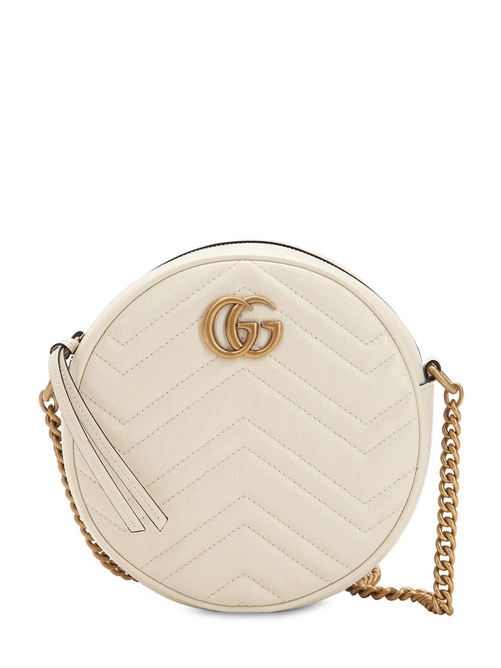 white circle gucci purse