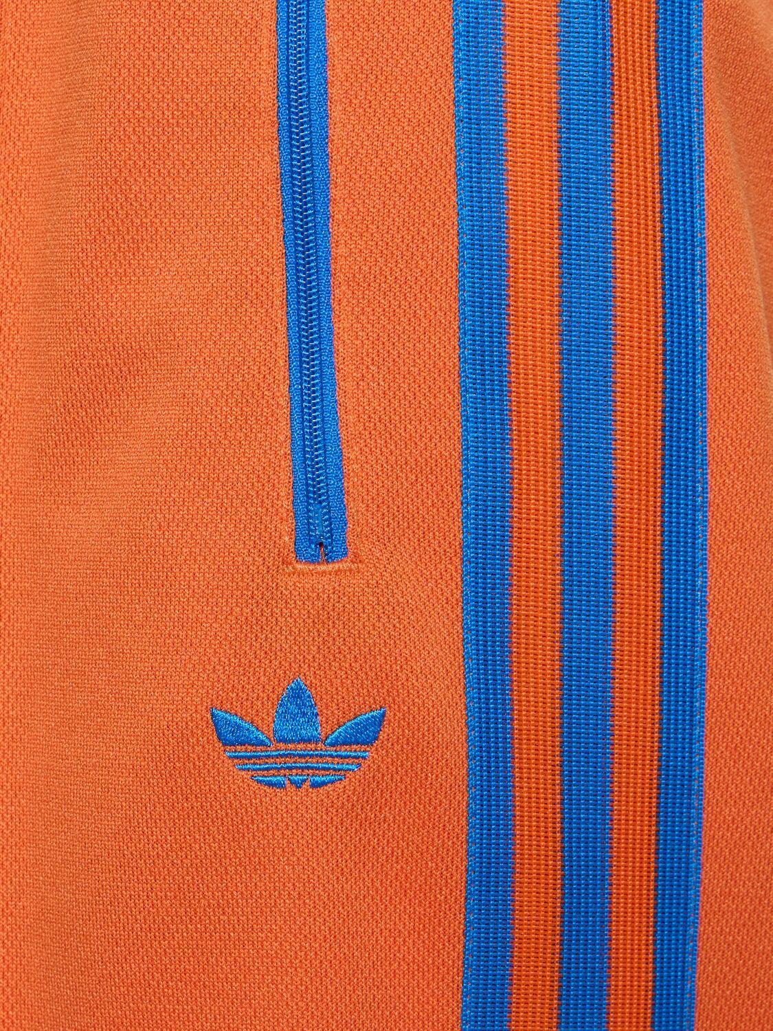 adidas Originals Montreal Track Pants in Orange | Lyst